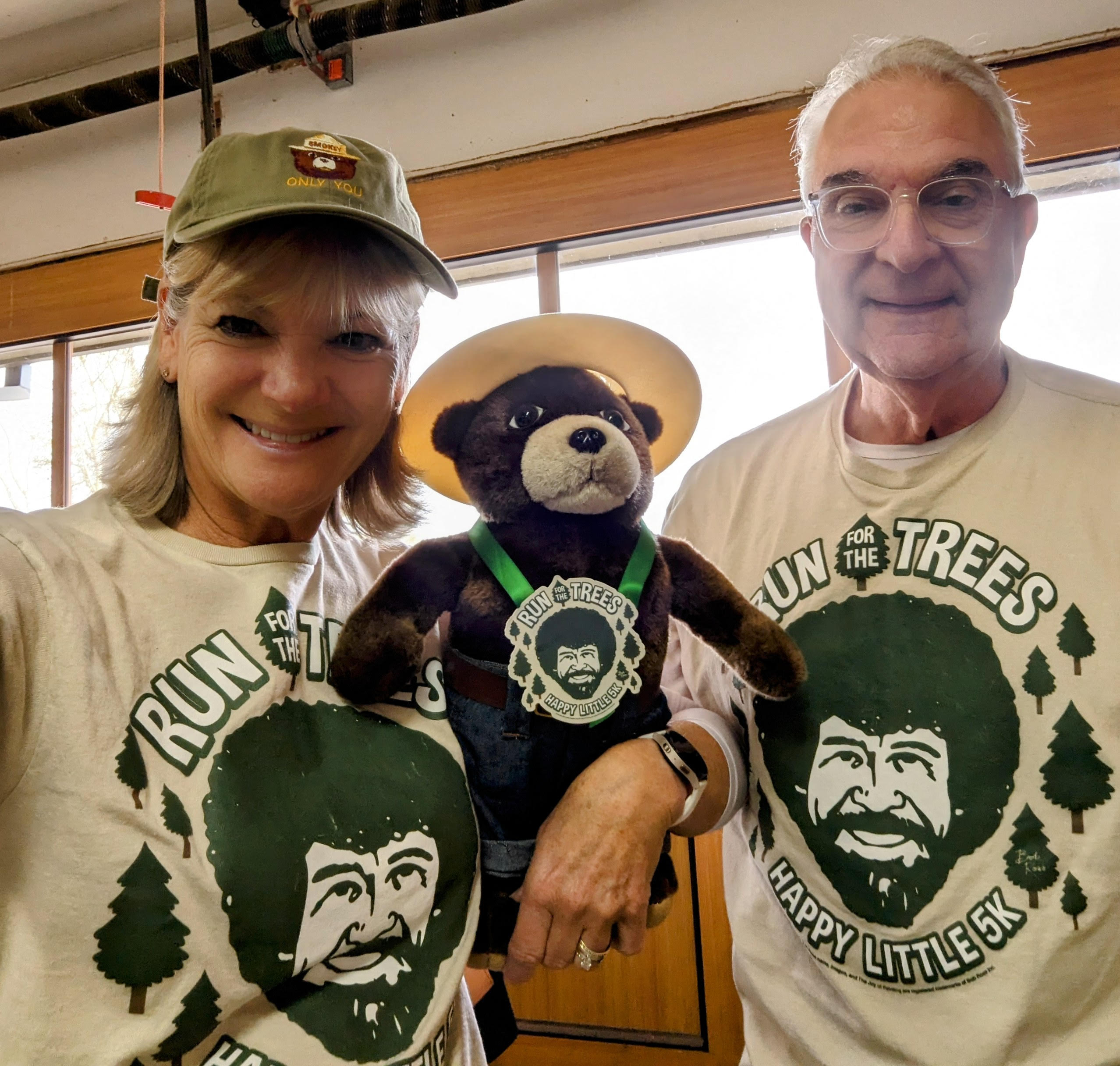 Runners with Smokey the bear